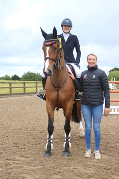 Charlotte Arnold is victorious in the Equitop Myoplast Senior Foxhunter Second Round at Dean Valley Equestrian Centre